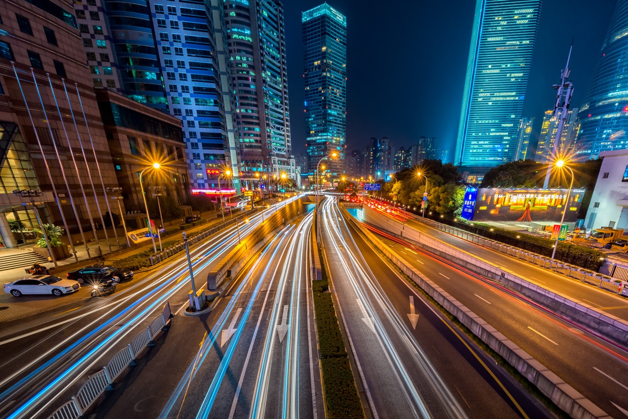 long exposure shot of a highway through a city