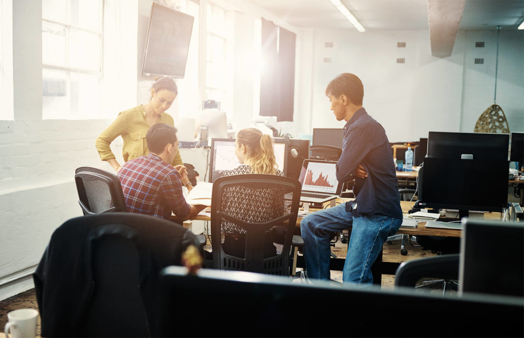 Group of people sitting together in office