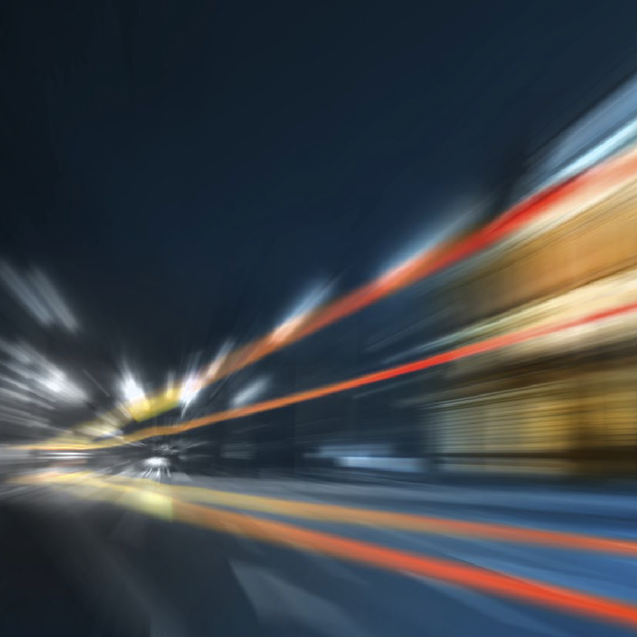 Carrier Connectivity: The Critical Component of Transportation Management 1 blurry long exposure shot of cars driving down a street