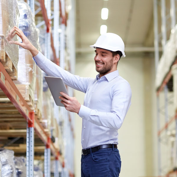 5 Signs It’s Time to Modernize Your Supply Chain Technology 1 warehouse specialist in safety gear